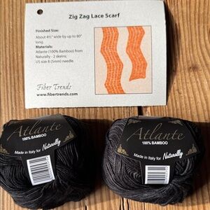 2 skeins Atlante Black 100% Bamboo Yarn with directions to knit lace scarf.